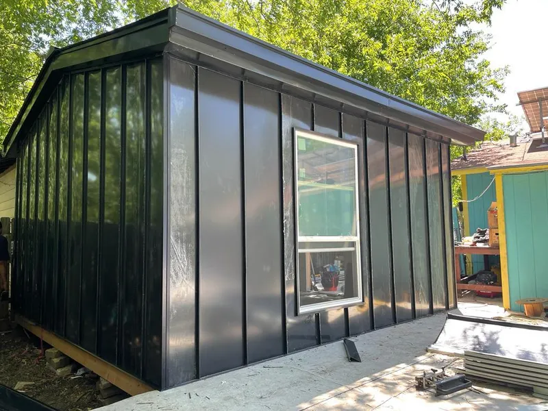 Black standing seam metal wall panels for Metal Roof Installation in Claverack