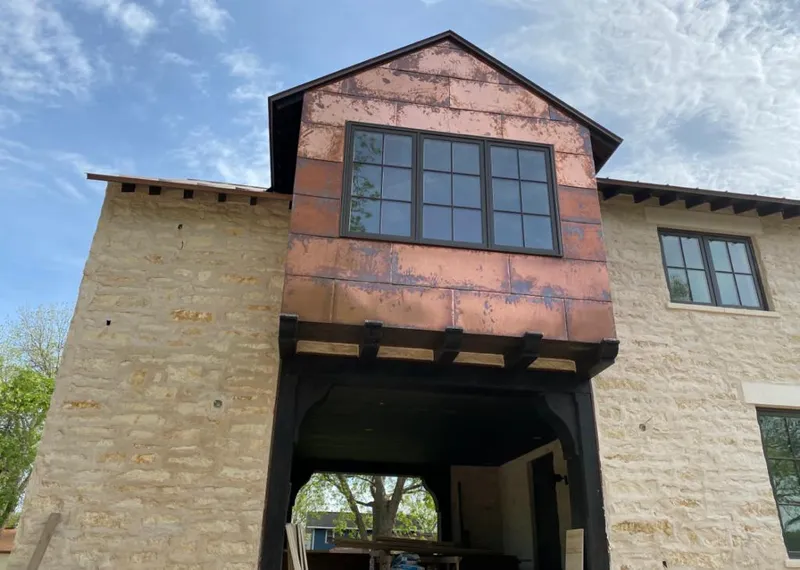 Copper metal panel facade on a stone building for Metal Roof Coating in Claverack